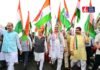 बारिश भी नहीं रोक पाई देशभक्ति! जयपुर में नड्डा-भजनलाल संग हजारों कार्यकर्ताओं ने तिरंगा लहराकर माहौल बदल दिया। Bhajanlal Sharma
